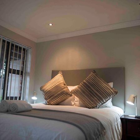 Palmwood Guesthouse 아만짐토티 외부 사진