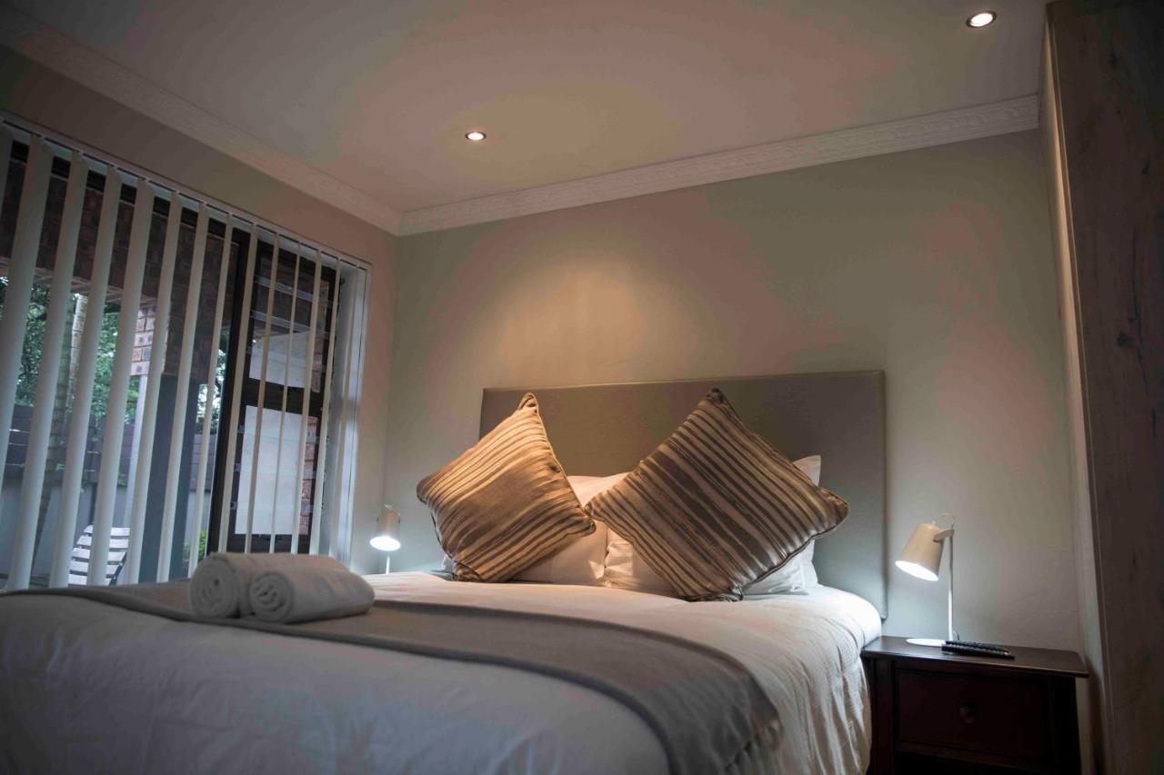Palmwood Guesthouse 아만짐토티 외부 사진