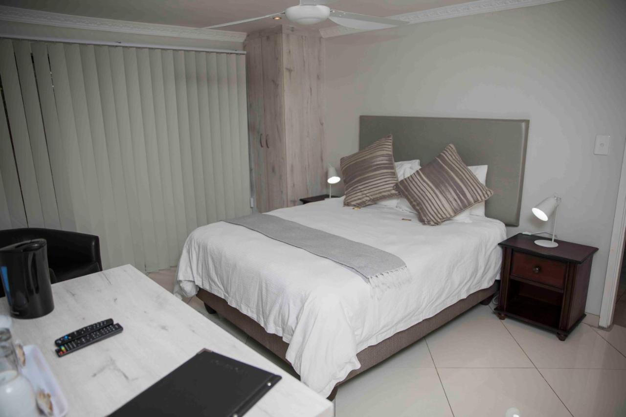 Palmwood Guesthouse 아만짐토티 외부 사진