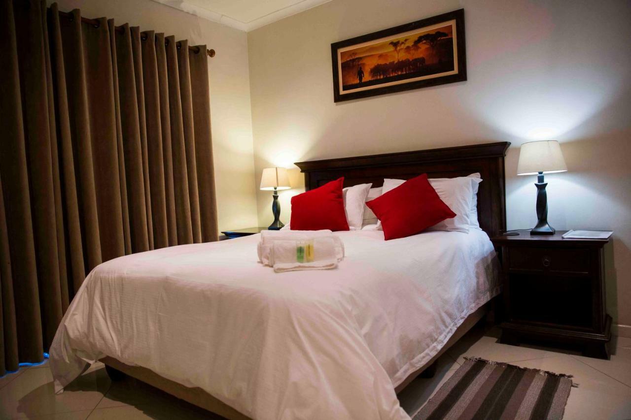 Palmwood Guesthouse 아만짐토티 외부 사진
